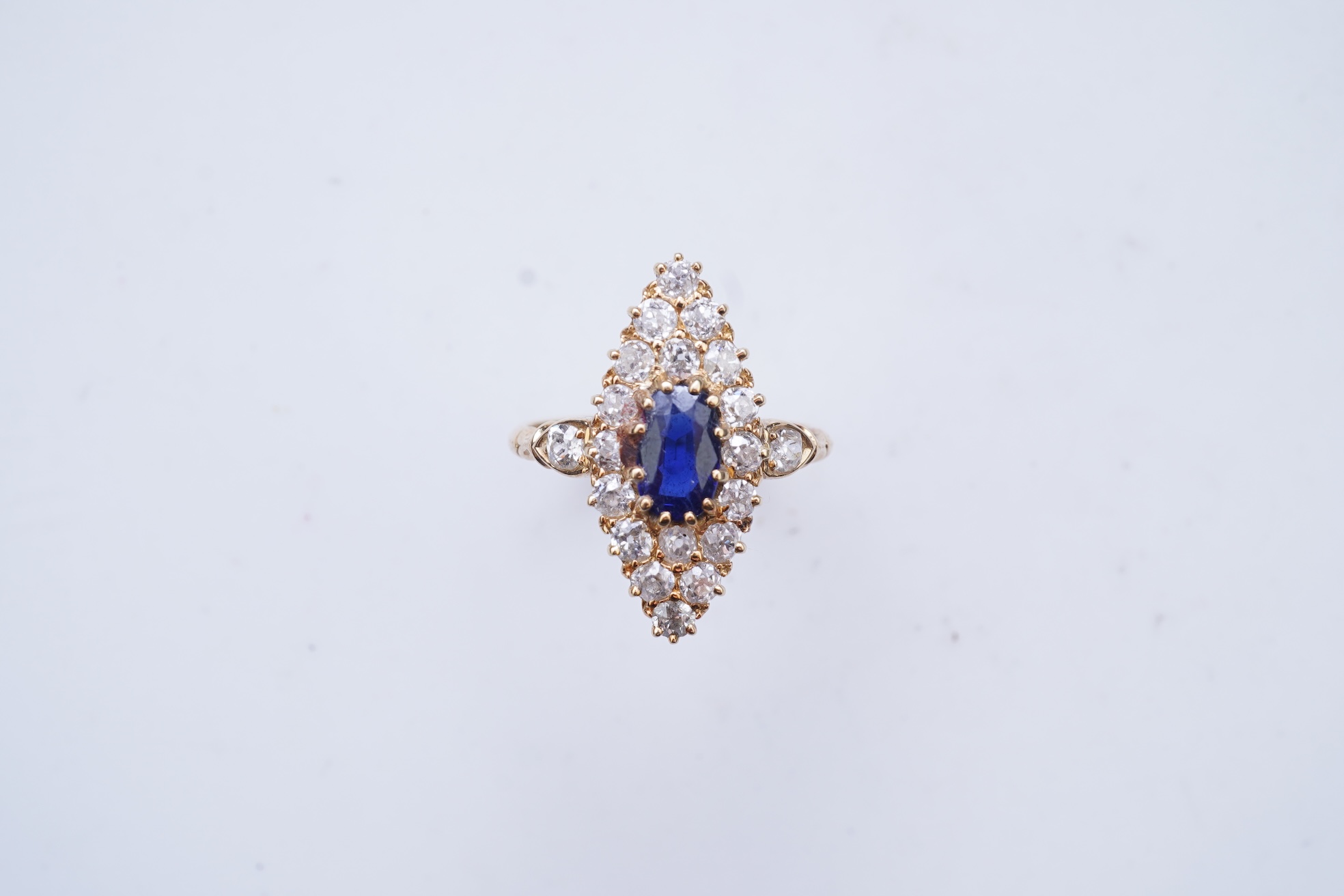 Eight pairs of earrings and pendant, comprising: a pair of onyx studs; a pair of emerald studs; a pair of sapphire and diamond drop earrings; a pair of opal drop earrings; a pair of garnet drop earrings; and a shell pend